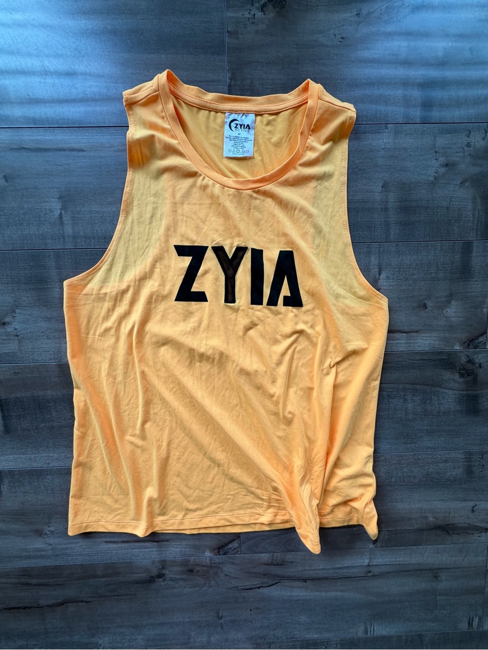 ZYIA Women's Orange Muscle Tank with Black Logo
